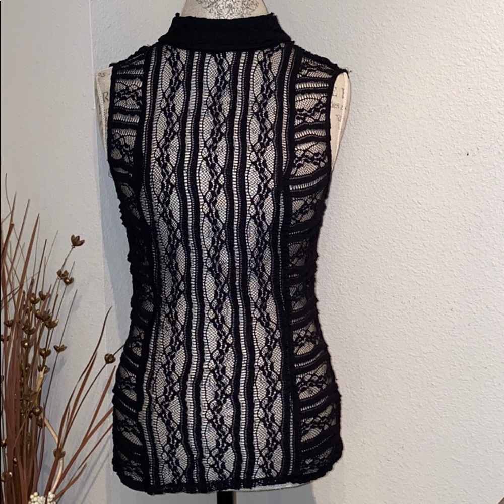 Bebe black lace, knit, cap-sleeve top, XS. Flattering fit.